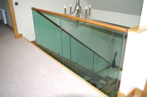 Frameless glass balustrade oak handrail Scotland