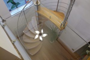 Glass landing designer oak spiral staircase