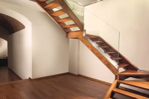 Contemporary oak and frameless glass staircase finished with hard wax oil London