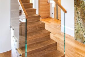 Contemporary oak zig zag with frameless glass staircase in Leeds finished with hardwax oil