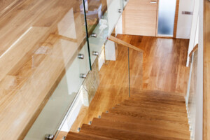 Contemporary oak zigzag staircase with frameless glass balustrades Contemporary oak zigzag staircase with frameless glass balustrades