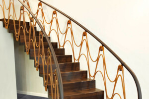 Contemporary zig zag staircase with forged iron suspension designed baustrades Contemporary zig zag staircase with forged iron suspension designed baustrades