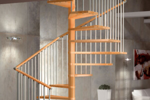 Modular spiral staircase beech treads and handrail with painted steel spindles Modular spiral staircase beech treads and handrail with painted steel spindles