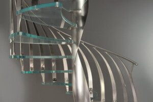 Contemporary Glass spiral staircase curved glass treads helical centre column with designer stainless steel curved balustrade1 Contemporary Glass spiral staircase curved glass treads helical centre column with designer stainless steel curved balustrade1