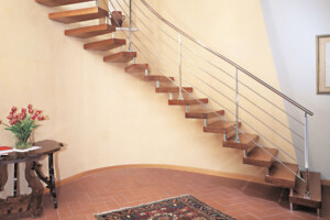 Curved oak floating staircase with stainless steel traversal rod balustrade1 Curved oak floating staircase with stainless steel traversal rod balustrade1