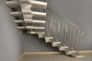 Designer central spine staircase with feature illuminated central spine and double curved designer curved spindles in brushed finish stainless steel Designer central spine staircase with feature illuminated central spine and double curved designer curved spindles in brushed finish stainless steel