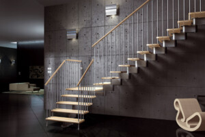 Central spine staircase with beech or oak treads and painted steel spindles and a wooden handrail modular style staircase Central spine staircase with beech or oak treads and painted steel spindles and a wooden handrail modular style staircase