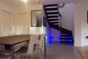 Floating staircase beech finished in grey with chrome finished stel spindles and rectangular profiled handrails London Floating staircase beech finished in grey with chrome finished stel spindles and rectangular profiled handrails London
