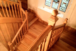 Traditional handmade oak designer staircase with cut strings and bespoke spindles and handrails Traditional handmade oak designer staircase with cut strings and bespoke spindles and handrails