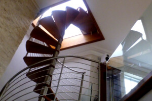 double height designer spiral oak staircase stainless steel balustrade and glass balustrade to first floor worksop south yorkshire double height designer spiral oak staircase stainless steel balustrade and glass balustrade to first floor worksop south yorkshire
